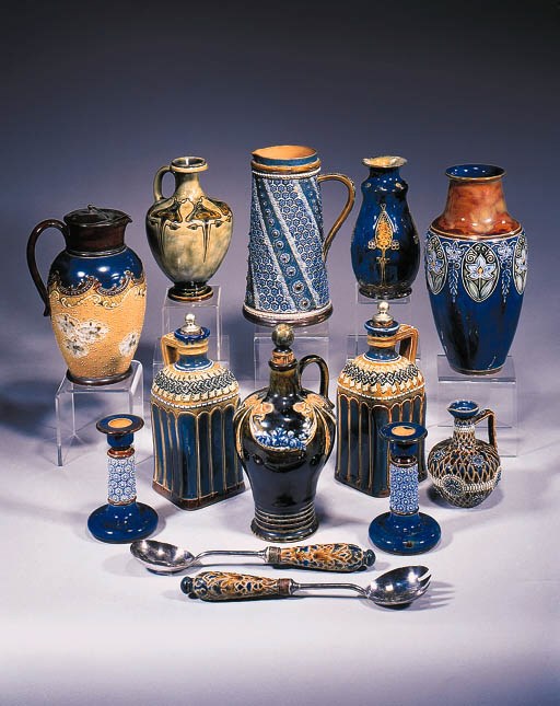 A stoneware decanter and stopper