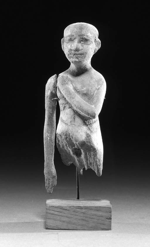 A WOODEN MODEL OF A MAN