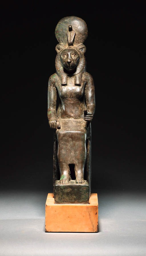 A BRONZE SEATED FIGURE OF THE GODDESS SEKHMET