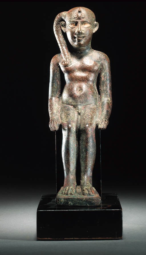 A BRONZE SEATED FIGURE OF HARPOCRATES