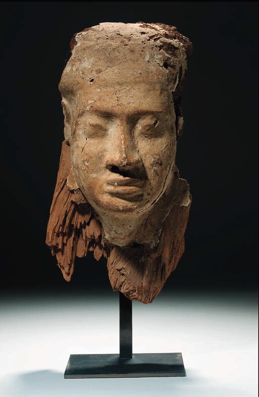 A GESSO-PAINTED WOODEN ANTHROPOID FUNERARY MASK