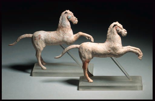 TWO CANOSAN TERRACOTTA HORSES