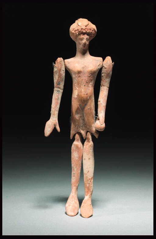 A CORINTHIAN TERRACOTTA DOLL