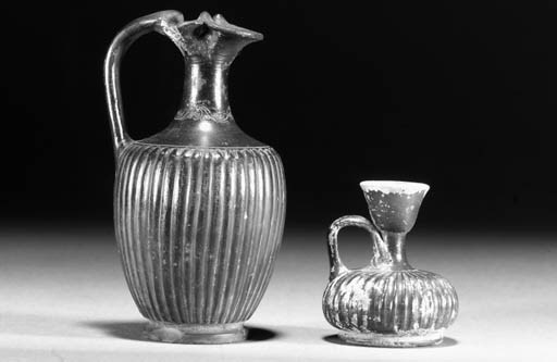 A GNATHIA WARE BLACK-GLAZED POTTERY OINOCHOE