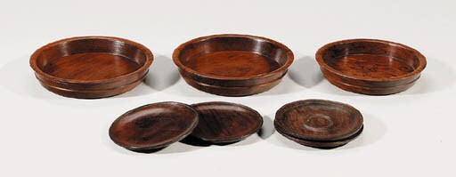 A Group of Seven Huanghuali Circular Dishes
