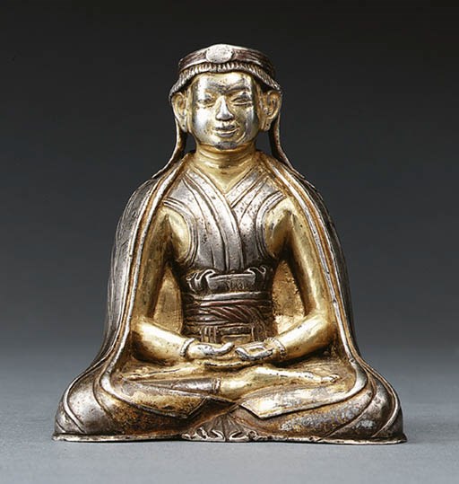 A Rare Silver Figure of a Lama