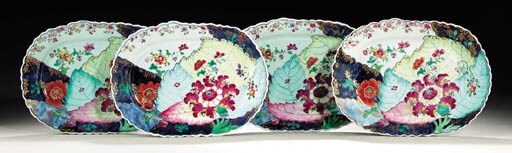 A SET OF FIVE TOBACCO LEAF PLATTERS