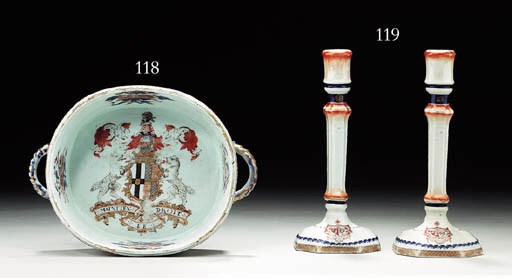 A PAIR OF ARMORIAL CANDLESTICKS