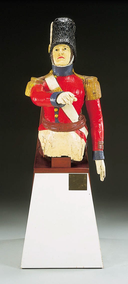 A CARVED AND PAINTED SHIP'S FIGUREHEAD OF A LEATHERNECK