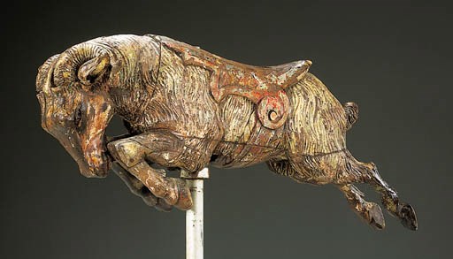 A CARVED AND PAINTED CAROUSEL GOAT JUMPER