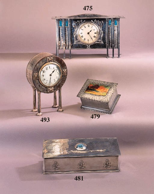 An Arts and Crafts pewter cigarette box and cover