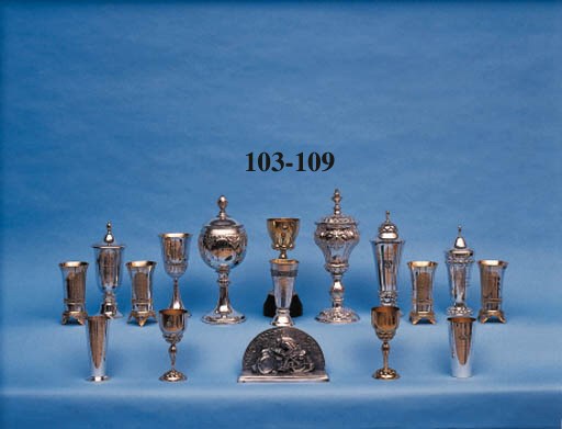 Racing Motorcyclist - A good silver-plated speltre desk trophy; well sculpted and detailed depicting a racing solo machine of the mid 1920s set against a backdrop of trees and hills; lacking base. c1928. Length 9