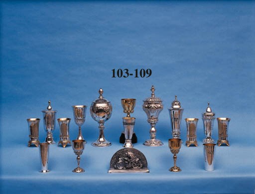 A group of three decorative trophy cups awarded for Motorcycle Hill Climb events; silver and silvergilt, two with applied enamelled club badge motifs, engraved and variously inscribed "Verkehrs-Verein Kelheim, 6. Ratish. Bergrennen 1930" ADAL and another uninscribed.