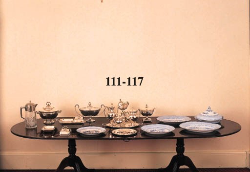 A fine silver tea and coffee service and matching tray; comprising tea-pot, coffee-pot, cream jug and sugar-bowl with oval format two handled tray; the teapot and coffee-pot both lidded having eagle-head ornamental spouts, pineapple designs to lids, foliate design to handles and raised embossed pattern to rim of lids, bodies and bases, and to border edge of tray. Overall weight 3060 grammes.
