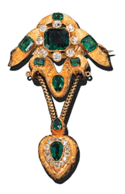AN EMERALD AND DIAMOND STOMACHER BROOCH