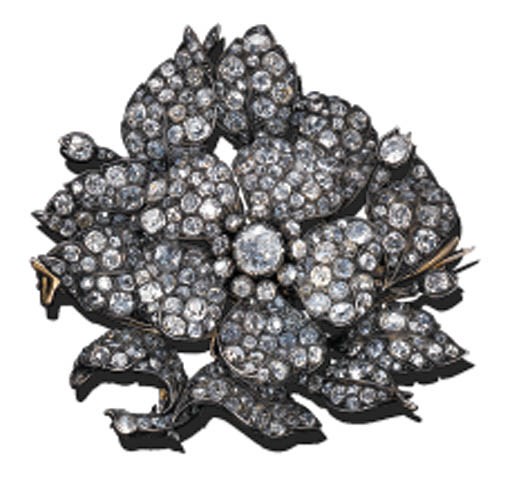 A DIAMOND WILD ROSE BROOCH
