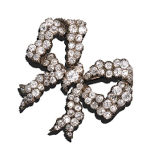 A DIAMOND RIBBON BOW BROOCH
