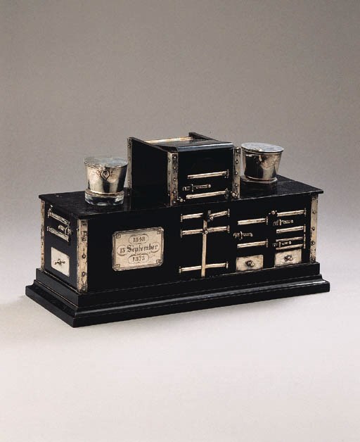 An unusual ebony silver-mounted inkstand