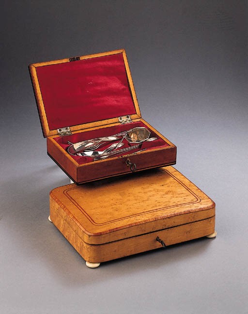 A mahogany and ebony brass inlaid veneered spoon-case with silver spoons and a maplewood veneered spoonbox with various spoons