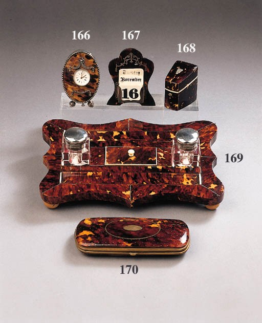 A tortoise-shell silver-mounted desk-calender and six various boxes