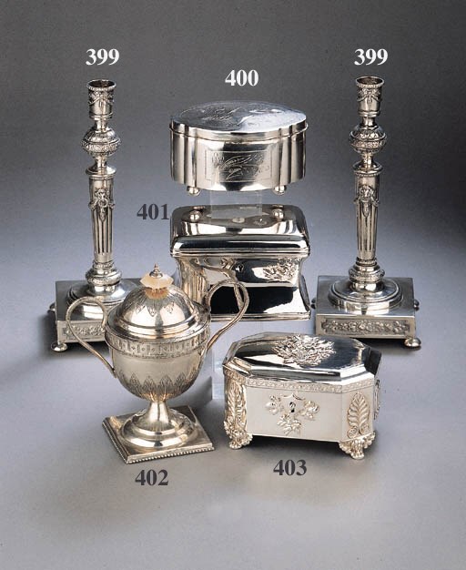 A pair of silver table candlesticks