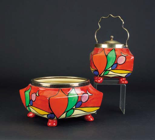 A  'Bizarre' biscuit barrel with plated cover