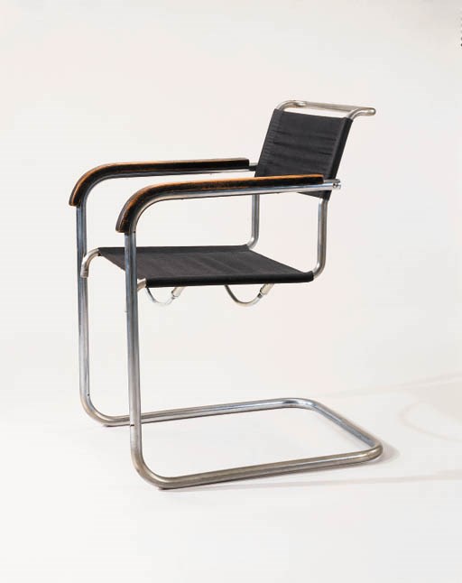 A CHROME-PLATED TUBULAR STEEL, WOOD AND CANVAS ARMCHAIR, MODEL B34