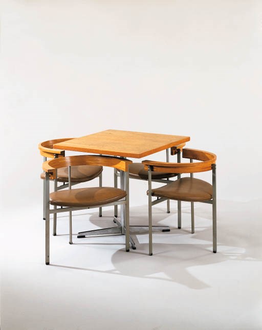 A CHROMIUM-PLATED METAL AND WOOD TABLE AND SET OF FOUR ARMCHAIRS