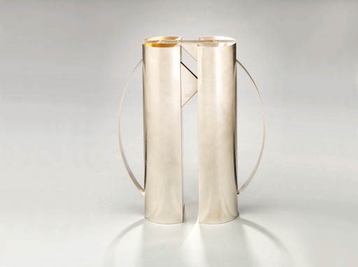 A PAIR OF SILVER PITCHERS