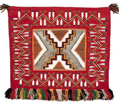 A NAVAJO GERMANTOWN SADDLE BLANKET