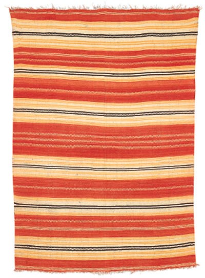 A ZUNI WEARING BLANKET