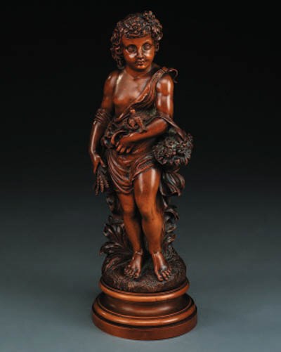 A Continental carved fruitwood figure of a young girl, mid 19th century
