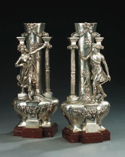 A pair of Continental silvered metal vases, late 19th or early 20th century