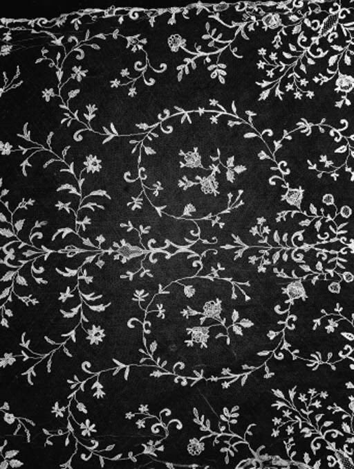 A STOLE OF BRUSSELS NEEDLEPOINT APPLIQU LACE, WITH A DELICATE SCROLLING FLORAL DESIGN--100 X 26IN. (256 X 66CM.), MID 19TH CENTURY