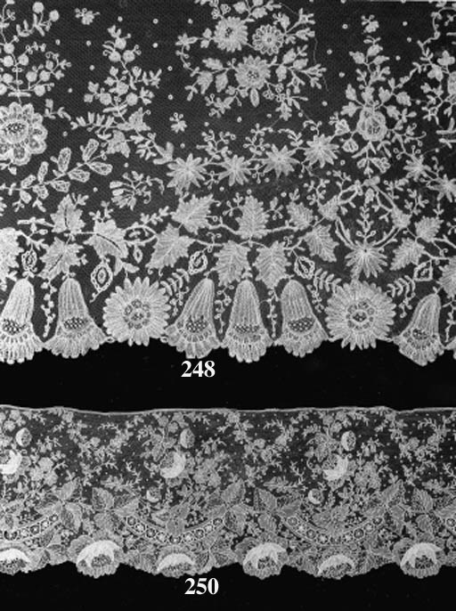 A FLOUNCE OF BRUSSELS POINT DE GAZE LACE, WITH A DENSE DESIGN OF ROSES WITH TIERED PETALS, FLORAL AND FOLIATE SWAGS AND DOTS--204 X 6.5IN. (520 X 16CM.)