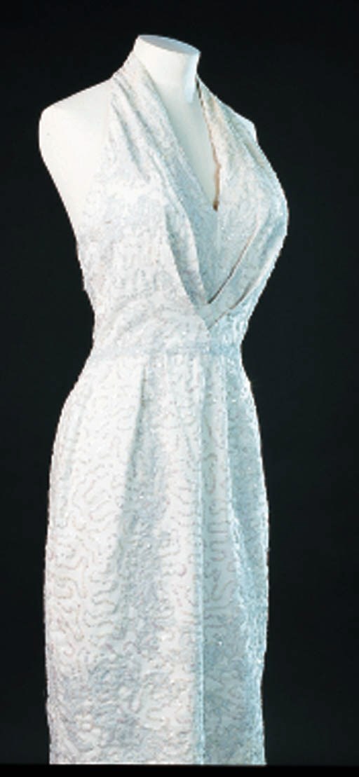 AN EVENING DRESS