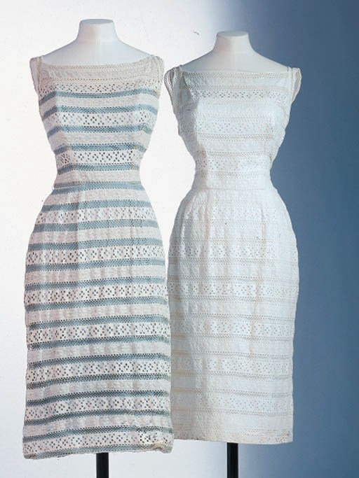 A PAIR OF LACE DRESSES