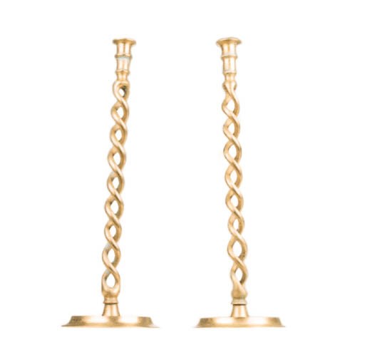 A PAIR OF LACQUERED BRASS CANDLESTICKS