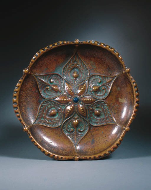 A patinated copper dish