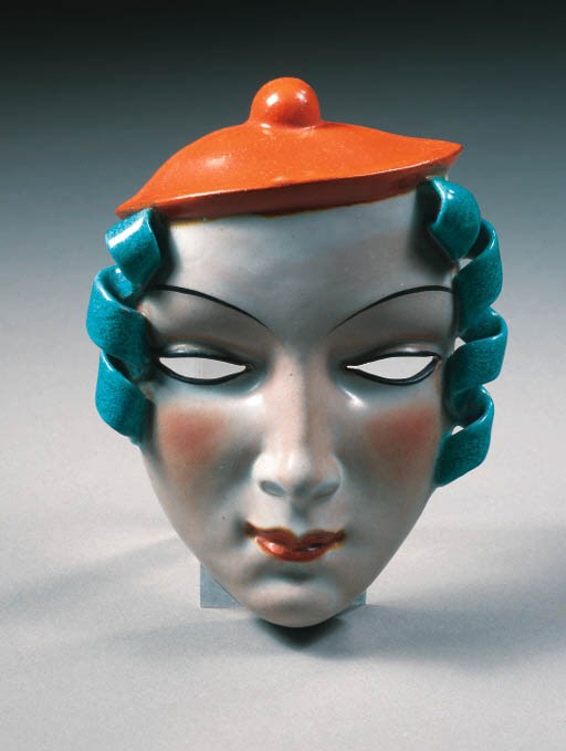 A glazed pottery mask