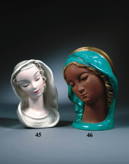 A glazed porcelain head of the Madonna
