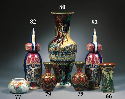 A pair of glazed pottery vases