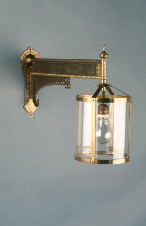 A BRASS WALL-LIGHT