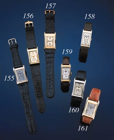 Rolex.  A white gold rectangular wristwatch