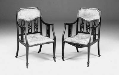A pair of Edwardian mahogany, line-inlaid and upholstered open armchairs