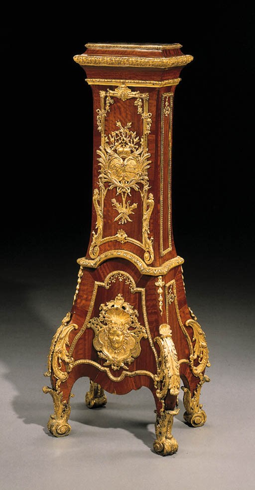 AN EARLY LOUIS XV ORMOLU-MOUNTED BOIS SATINE AND AMARANTH PEDESTAL