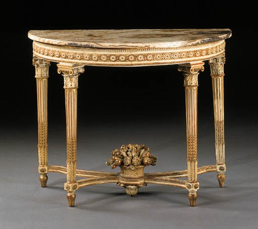 A LOUIS XVI CREAM-PAINTED AND PARCEL-GILT SIDE TABLE