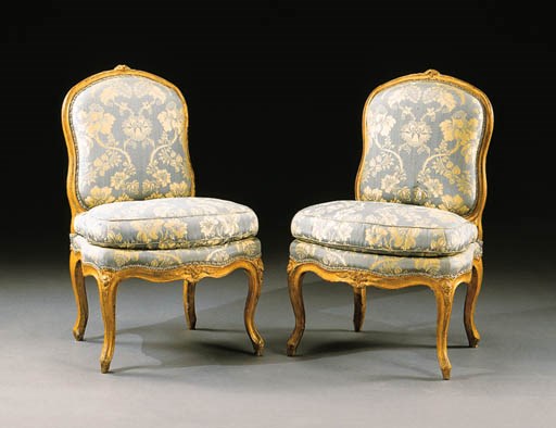 A PAIR OF LOUIS XV GILTWOOD CHAISES