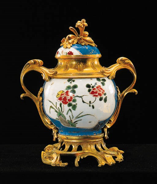 A LOUIS XV ORMOLU-MOUNTED CHINESE PORCELAIN TWO-HANDLED VASE AND COVER
