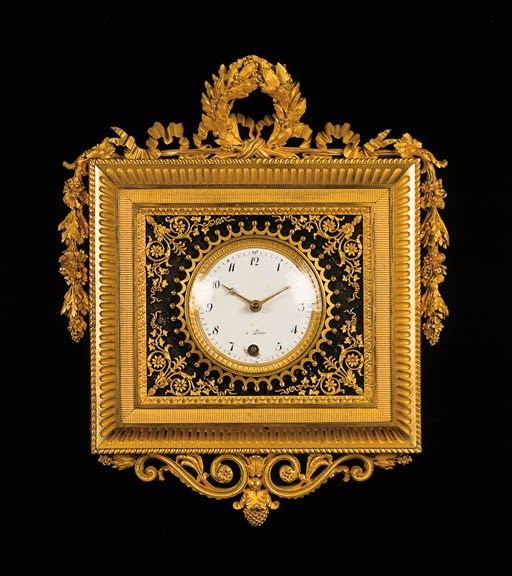 A LOUIS XVI ORMOLU CARTEL CLOCK